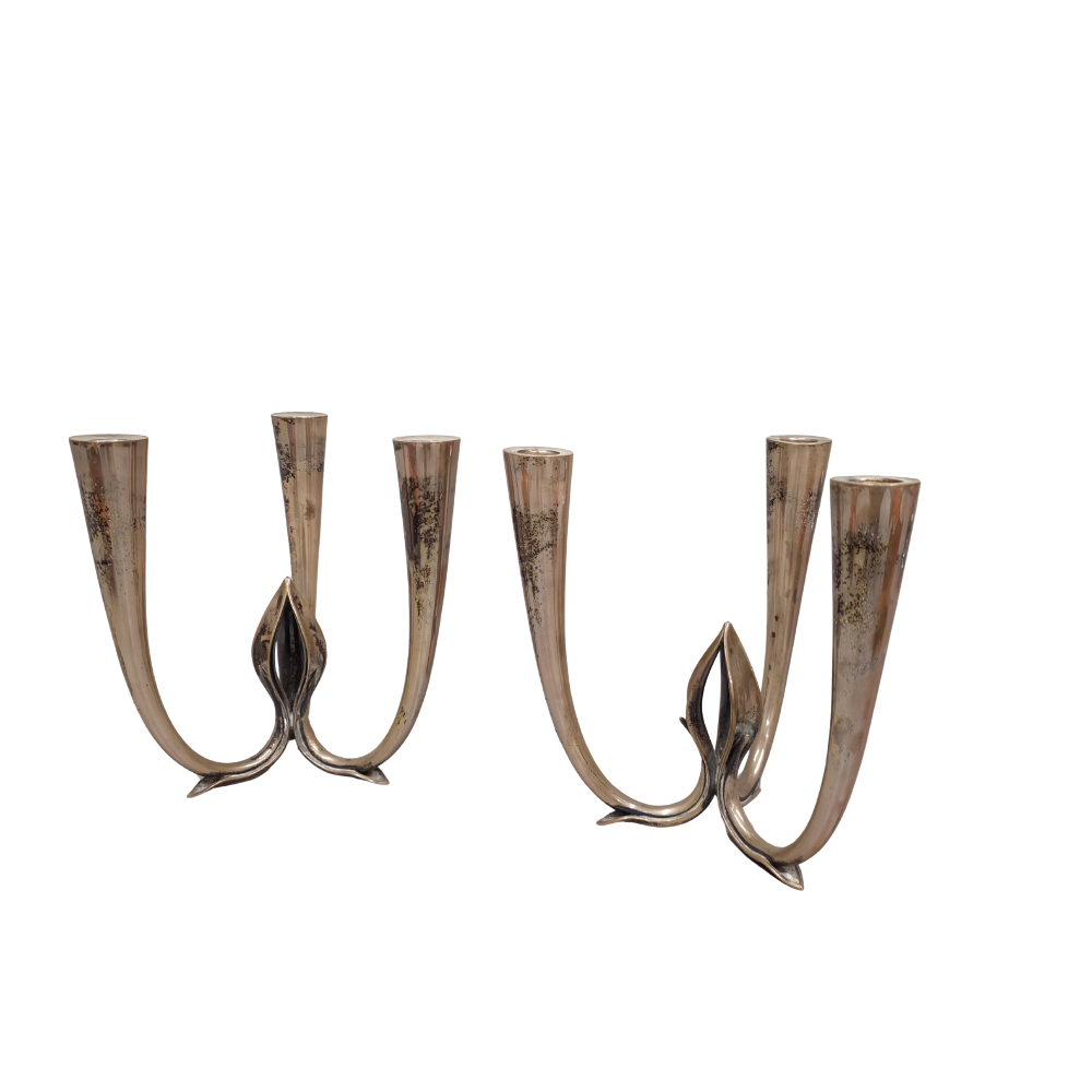 PAIR OF SPANISH PUNCHED SILVER CANDLESTICKS.