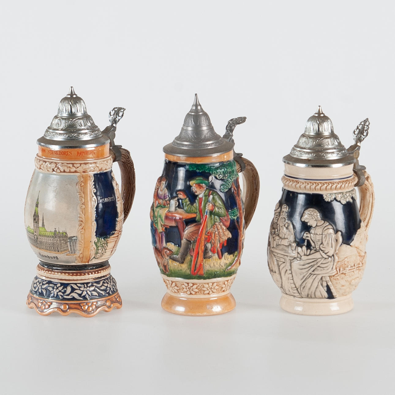 A set of three ceramic and pewter beer chains, Germany. Ceramics ...