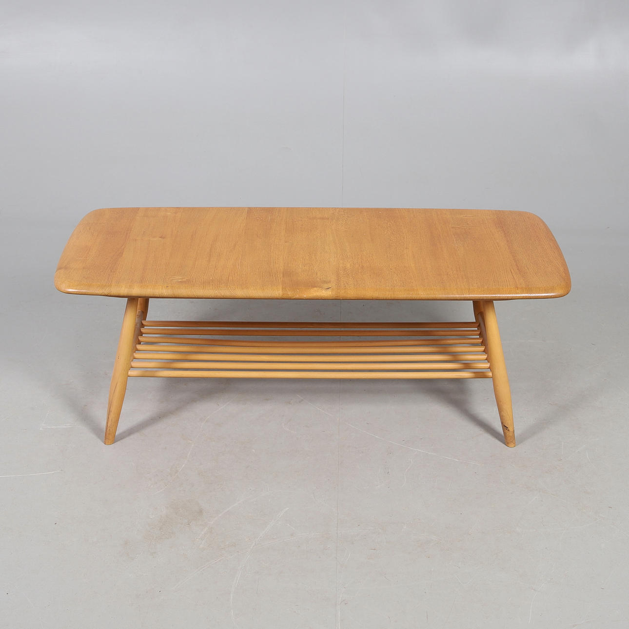 AN ERCOL COFFEE TABLE.