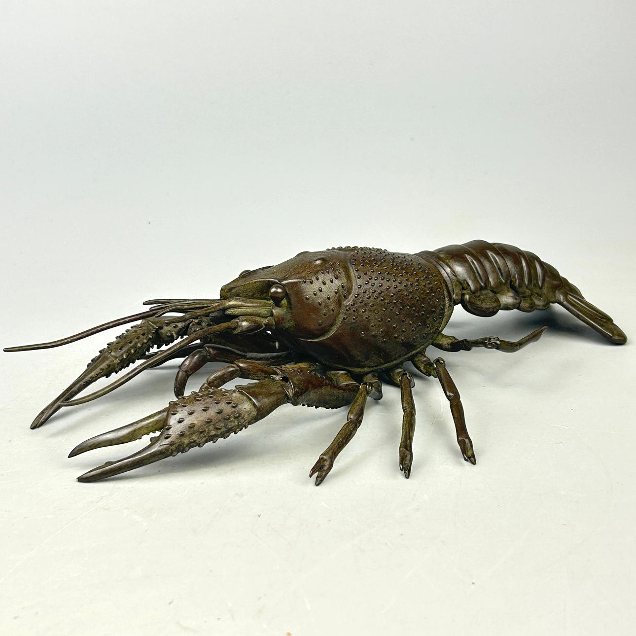 BRONZE ARTICULATING LOBSTER.