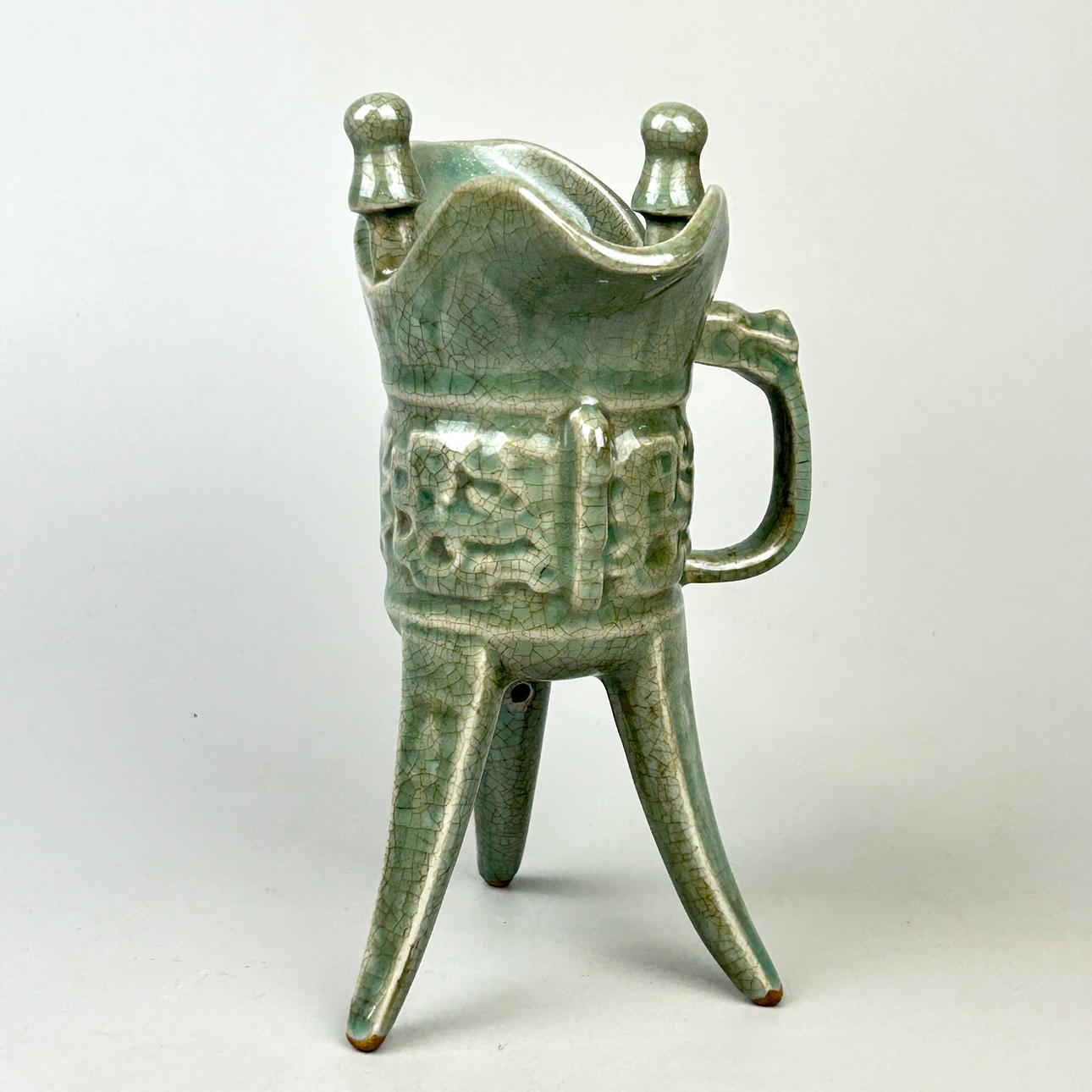 CHINESE ARCHAIC FORM CELADON WINE CUP.