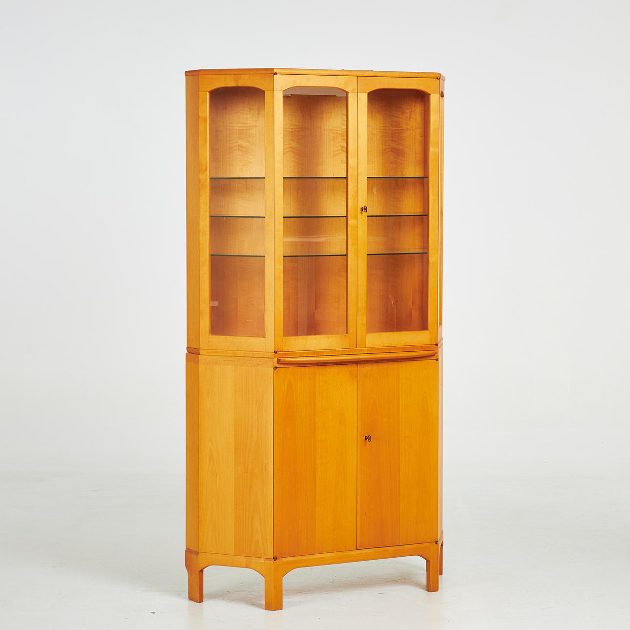 CARL MALMSTEN. A “Exception” display cabinet, cupboard with display top, removable glass shelves, pull-out top, veneered with birch, second half of the 20th century.
