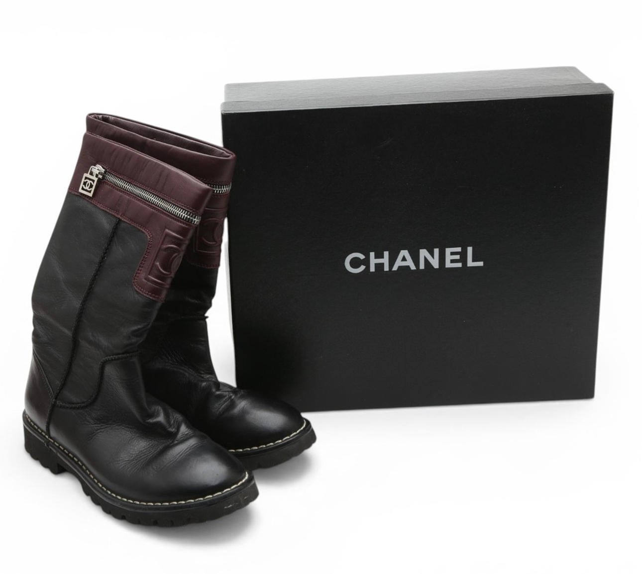 CHANEL. Half-length cocoon boots with logo.