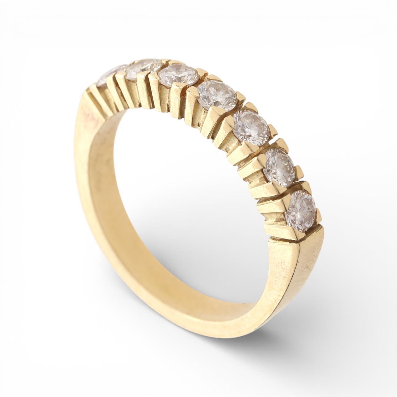 Half-eternity diamond ring.