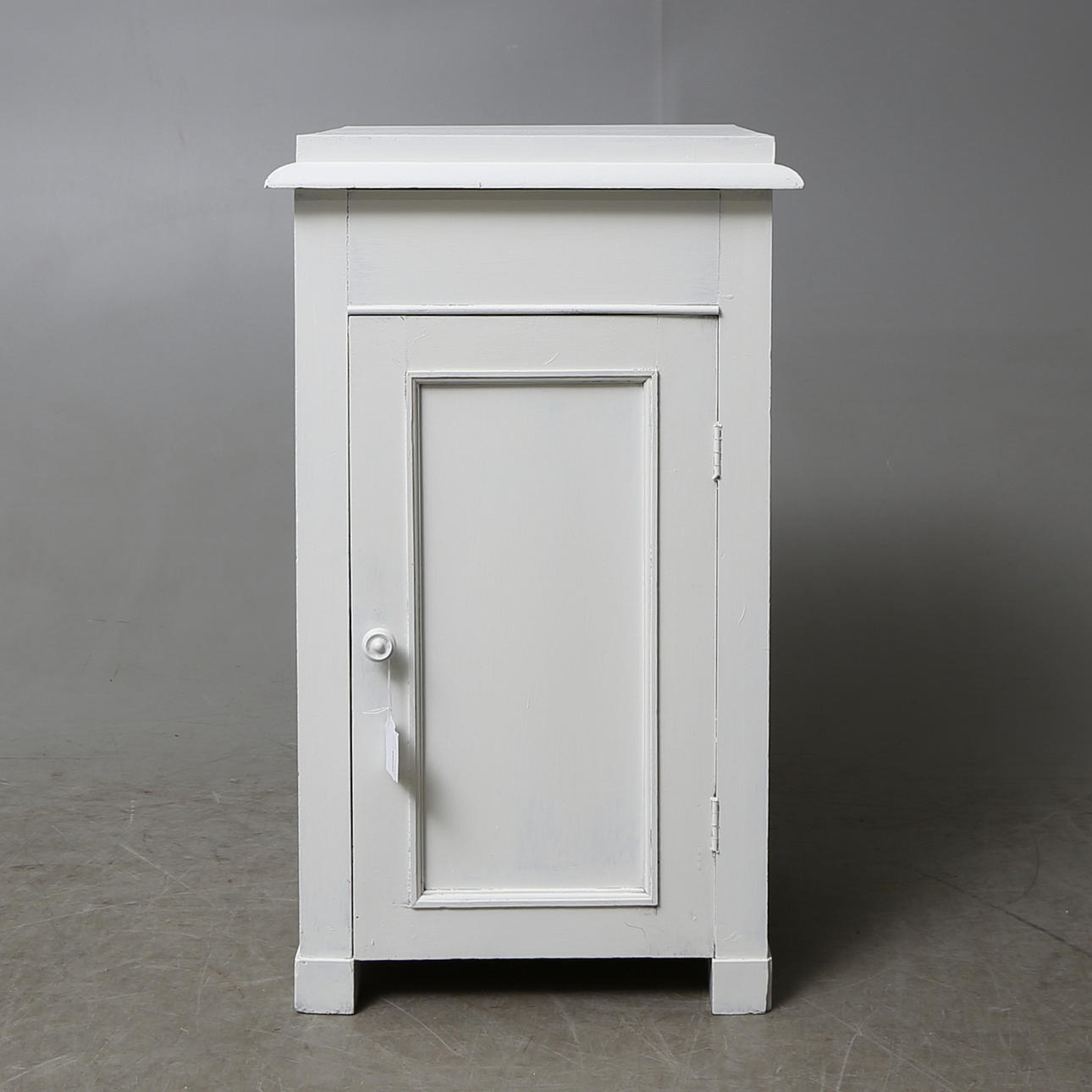 KOMOD, omkring 1900.