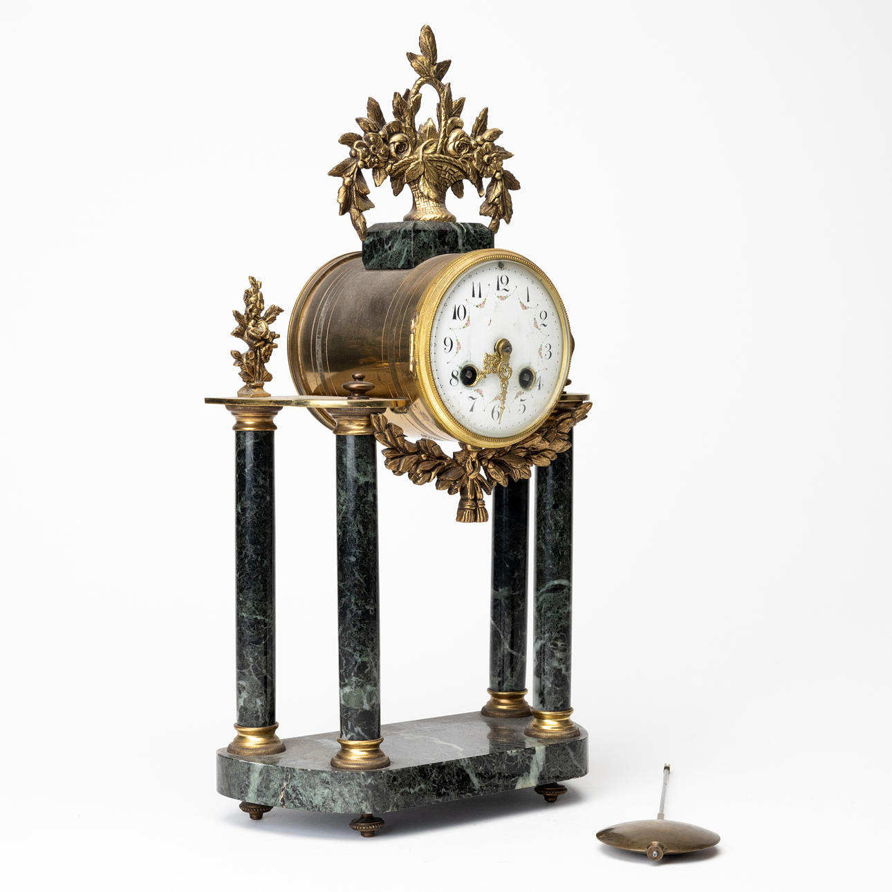 A brass and marble table pendant, 20th century.