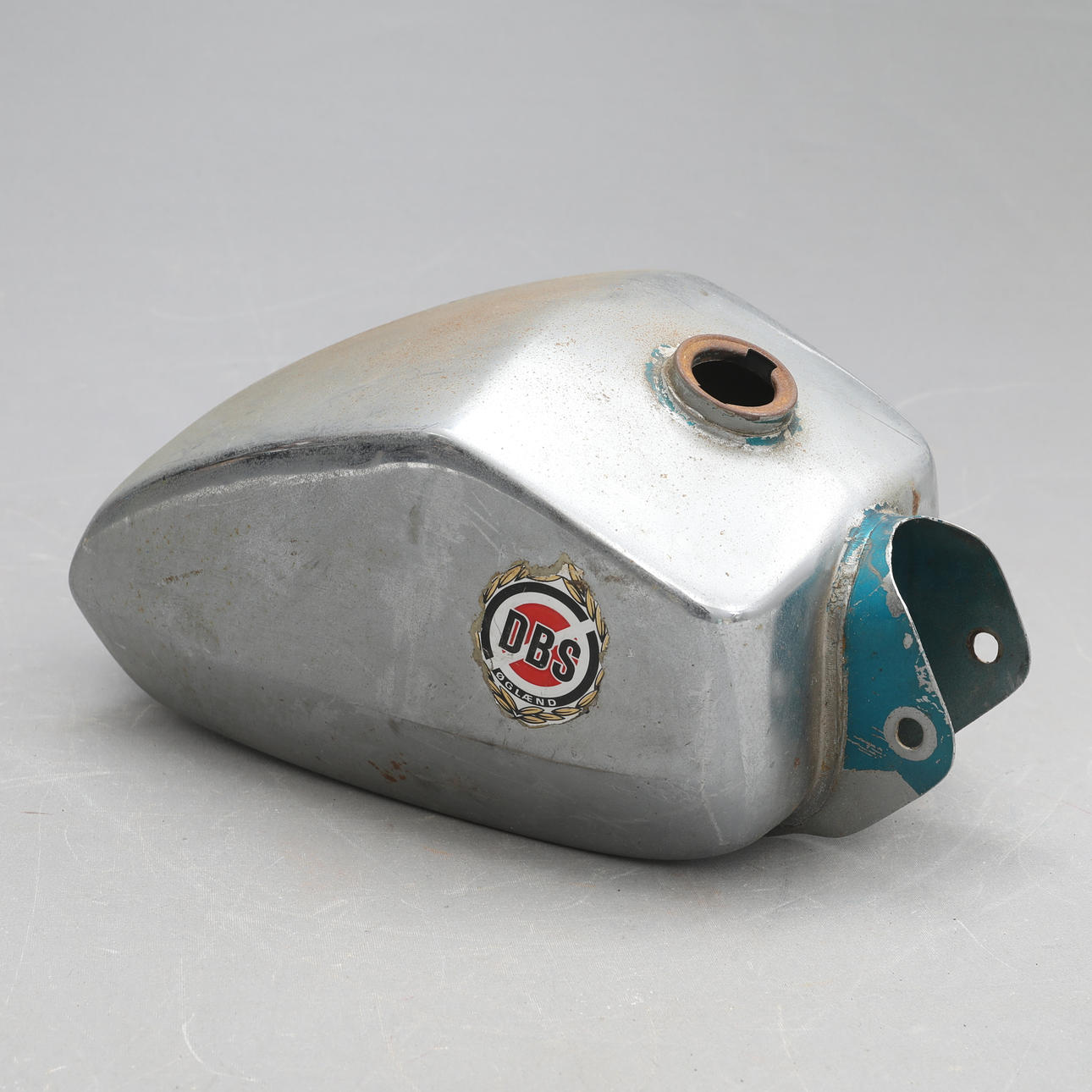 A petrol tank, marked DBS, mid 20th century.