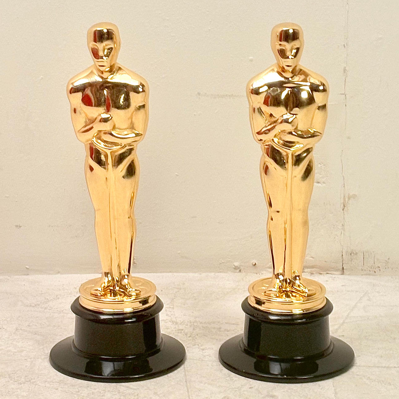 PAIR OF HOLLYWOOD STYLE TROPHY ORNAMENTS. Miscellaneous - Miscellaneous ...