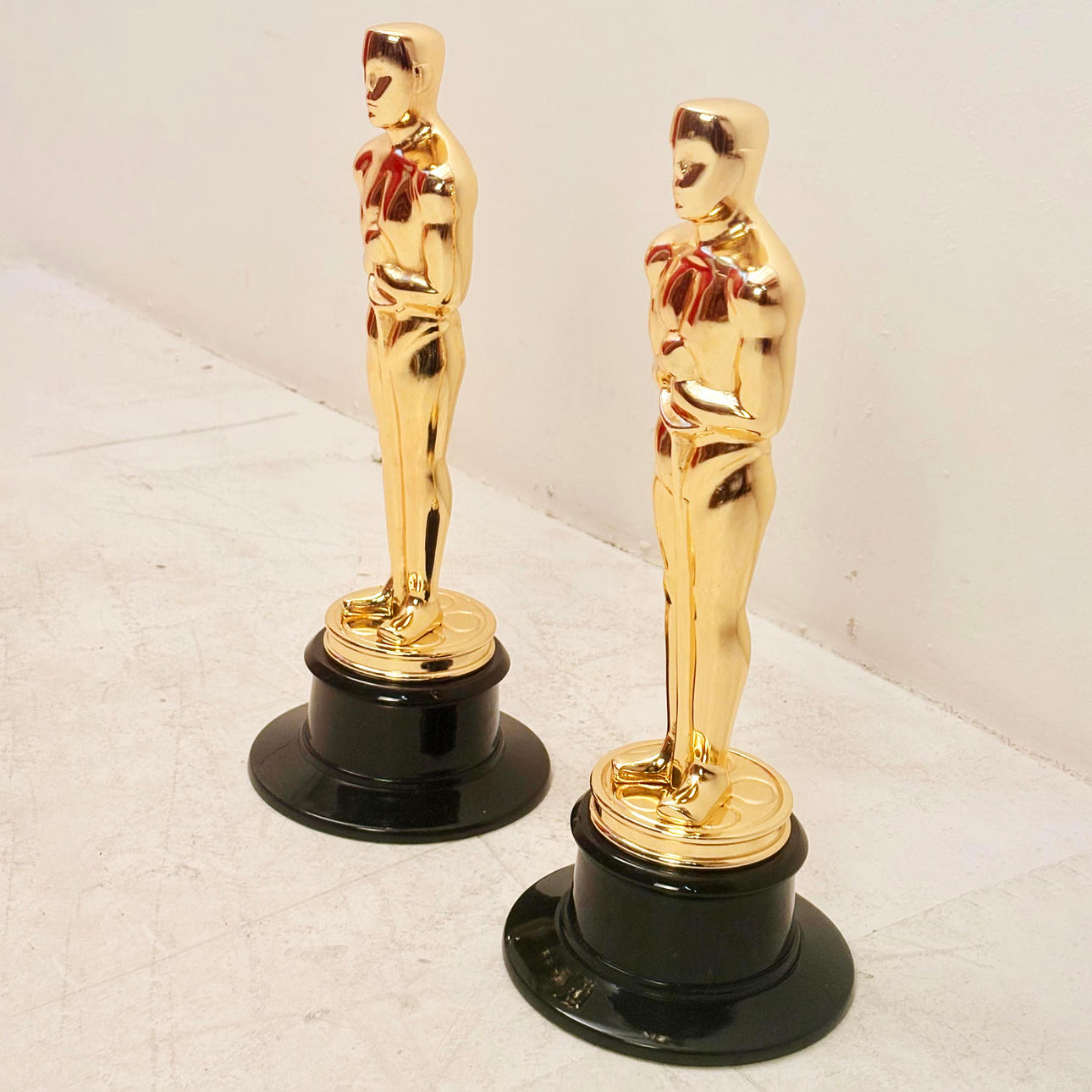 PAIR OF HOLLYWOOD STYLE TROPHY ORNAMENTS. Miscellaneous - Miscellaneous ...