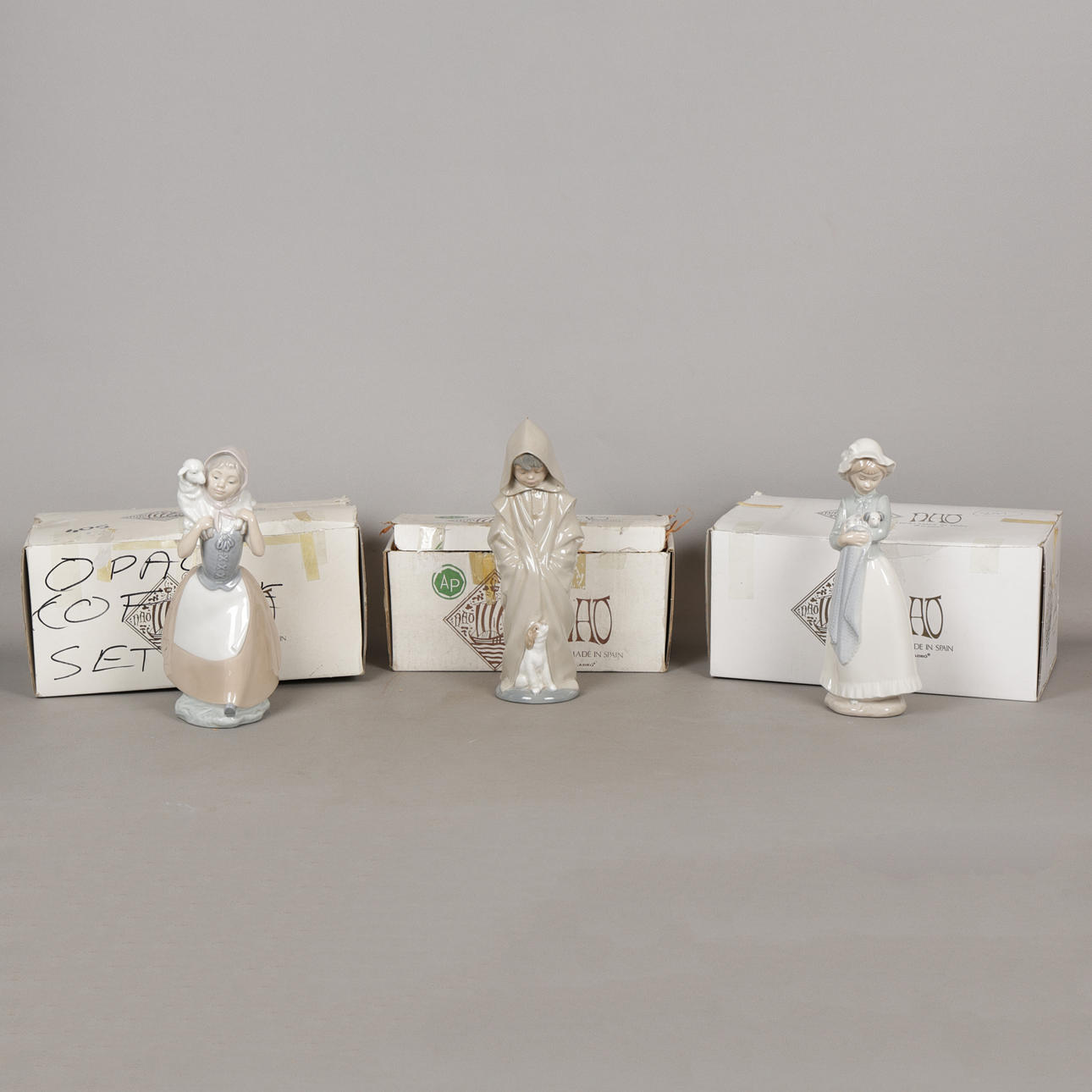 THREE NAO FIGURINES (3).