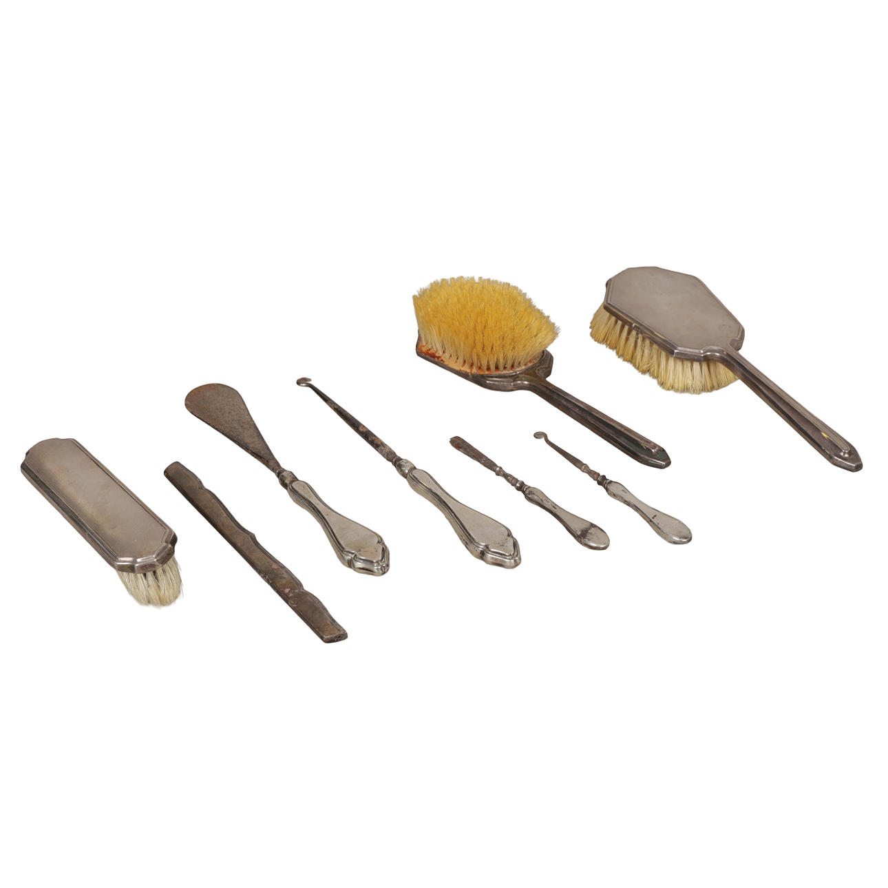 A SILVER DRESSING TABLE, A SILVER HANDLED MANICURE SET (8).