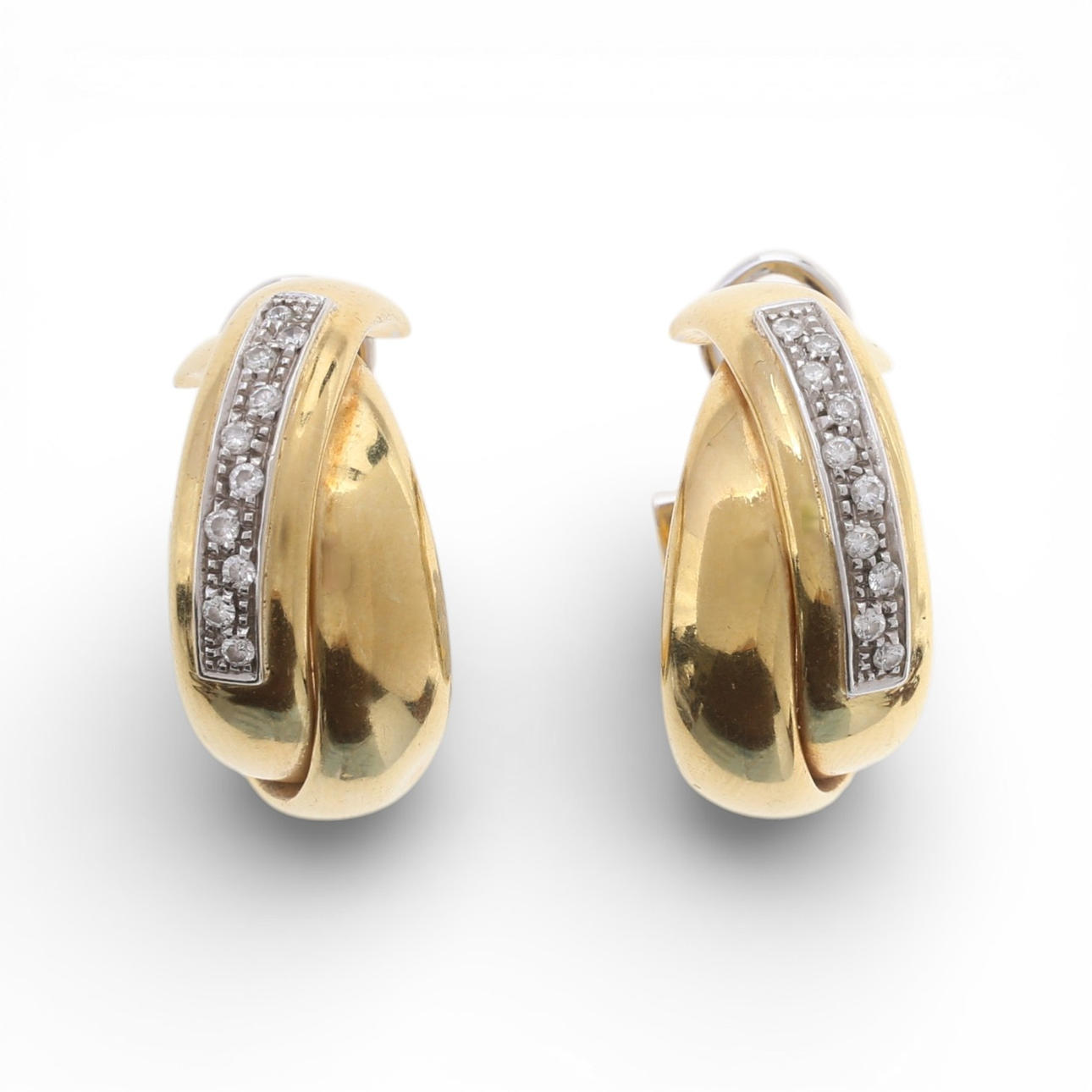 Gold and diamonds creole earrings.