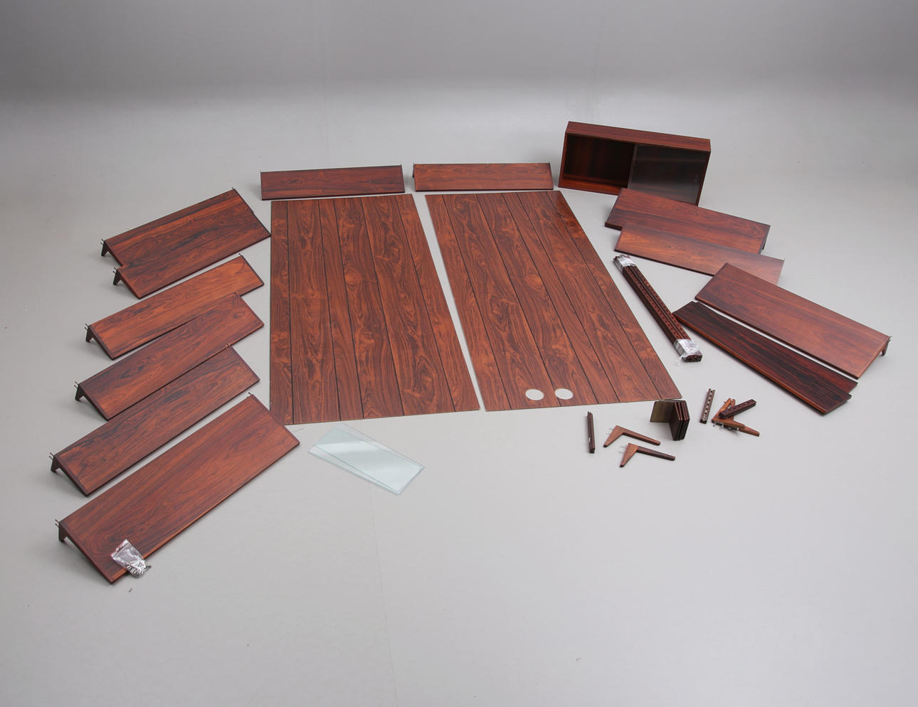 Wall mounted shelving system, jacaranda, 1960/70's.