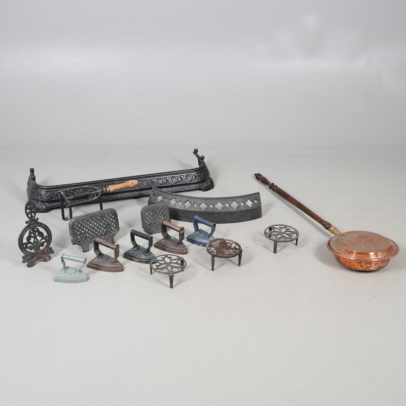 CAST IRON FIRE KERBS, FLAT IRONS, TRIVETS WARMING PAN.