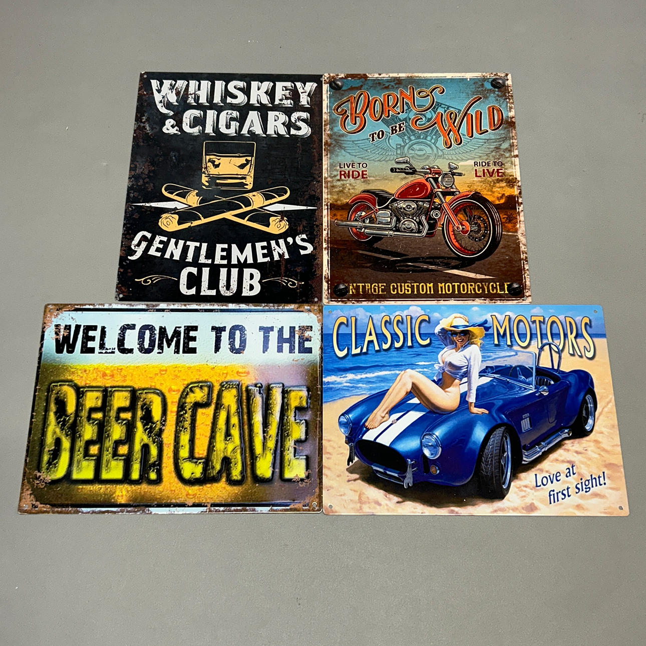 FOUR ADVERTISING SIGNS.