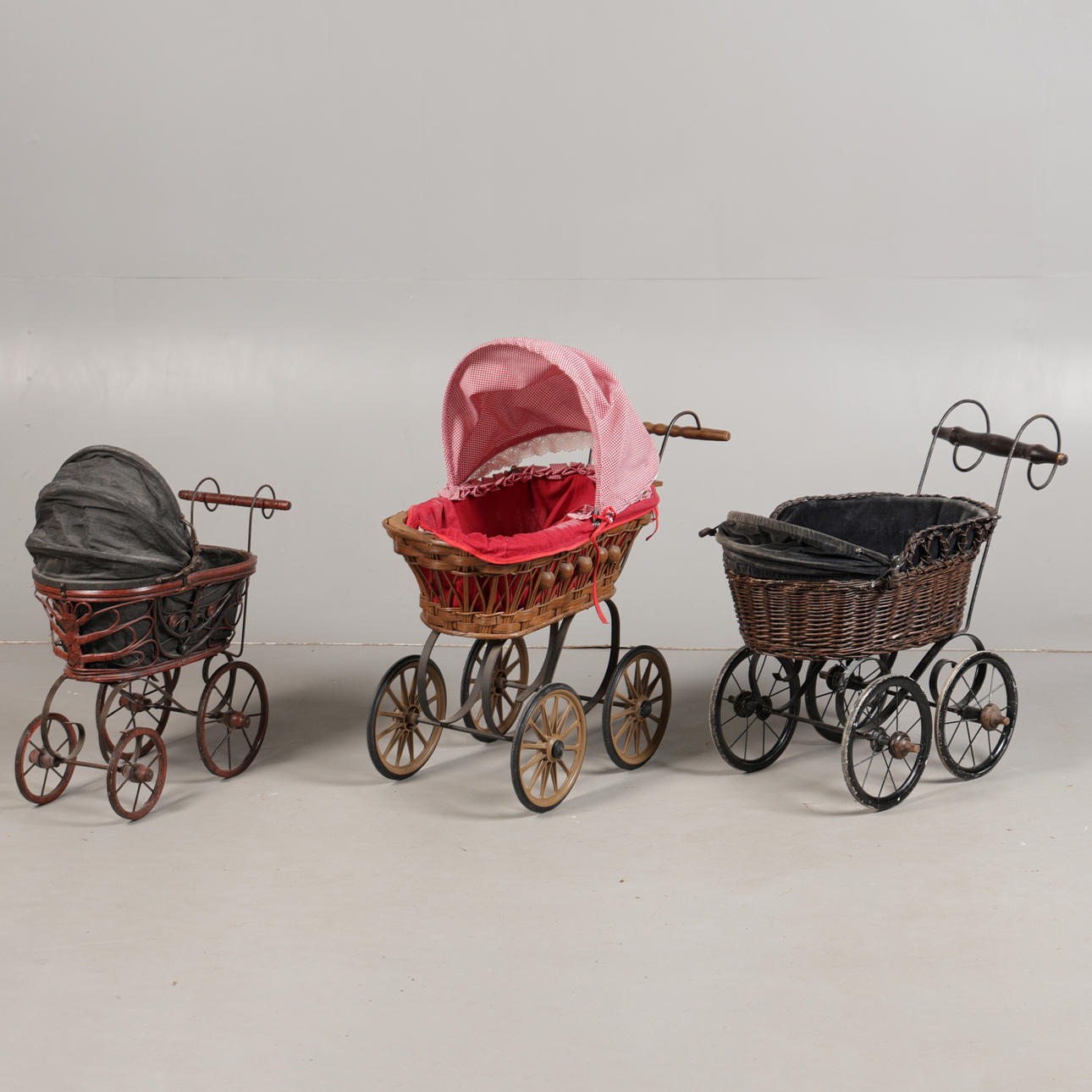 THREE VICTORIAN STYLE DOLLS PRAMS AND A DOLL (4).