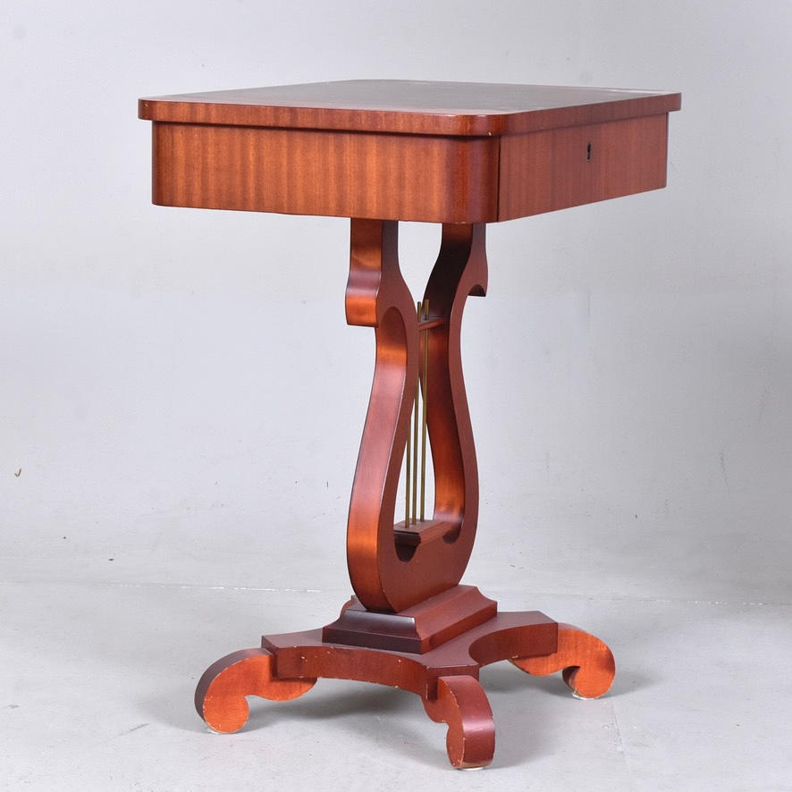 A 20th century sewing table with drawer.