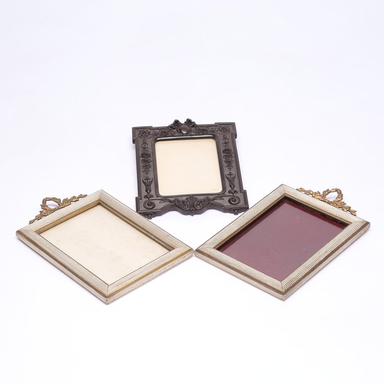 Three wooden frames and Bois Durci, 1900.