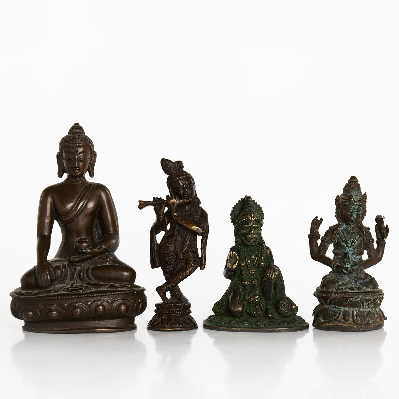 FOUR BUDDHS/DEITIES, patinated bronze, Asia.