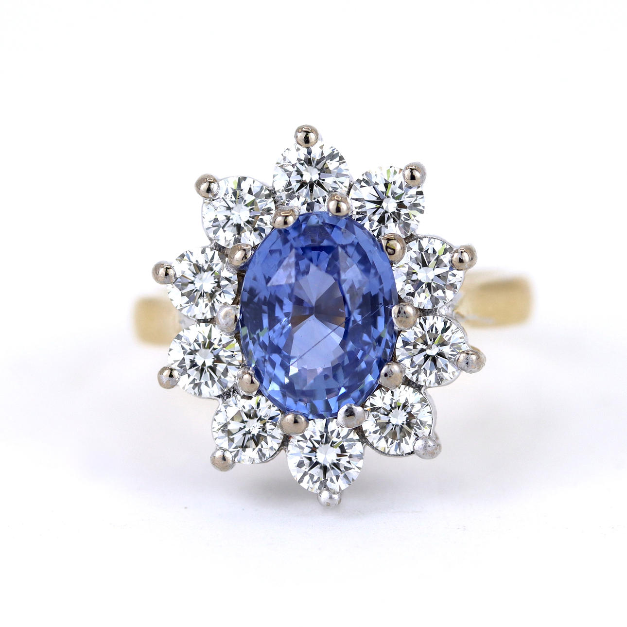 18CT WHITE GOLD CEYLON SAPPHIRE & DIAMOND SET RING.
