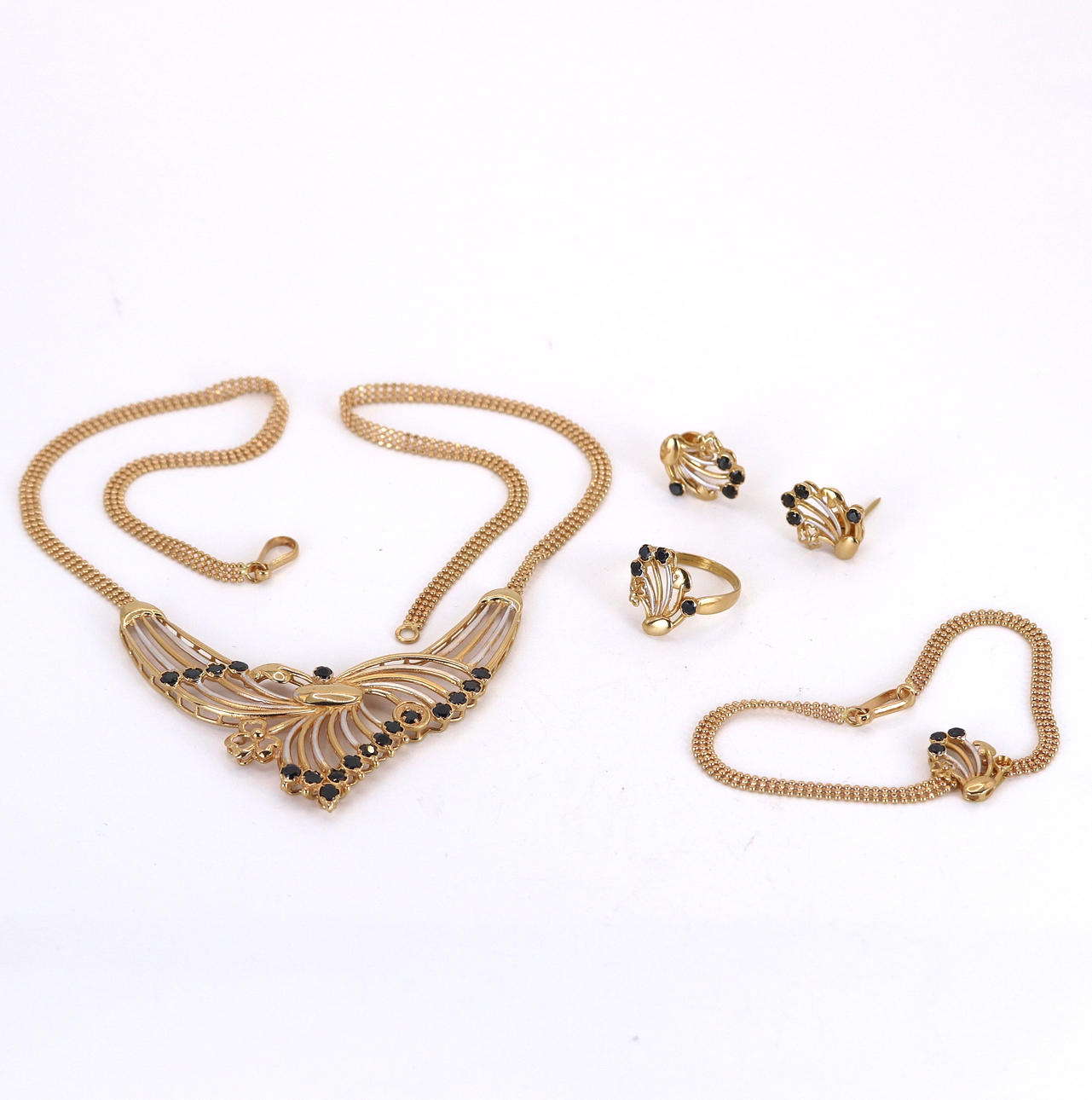 HIGH CARAT GOLD SUITE.