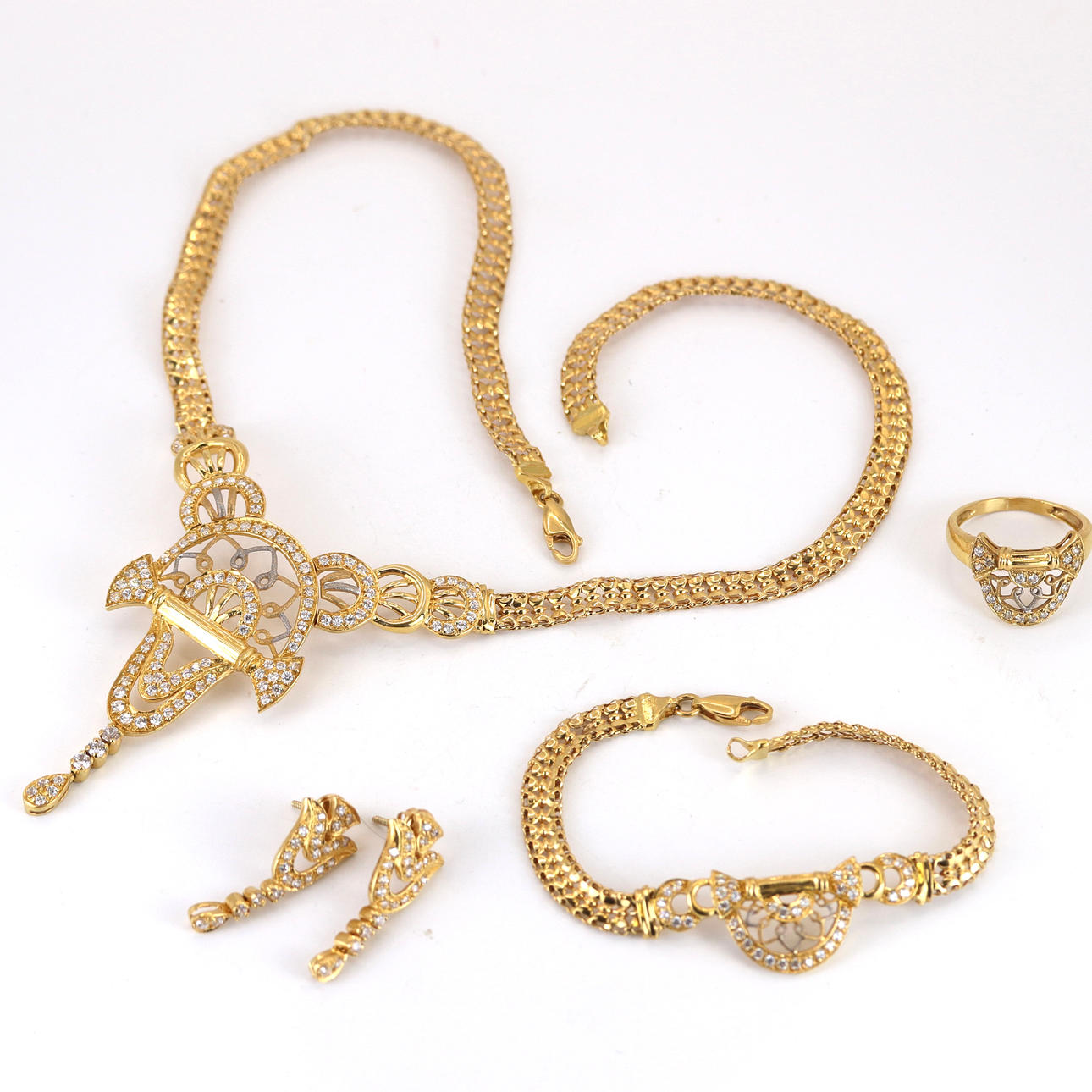 21CT YELLOW GOLD SUITE.