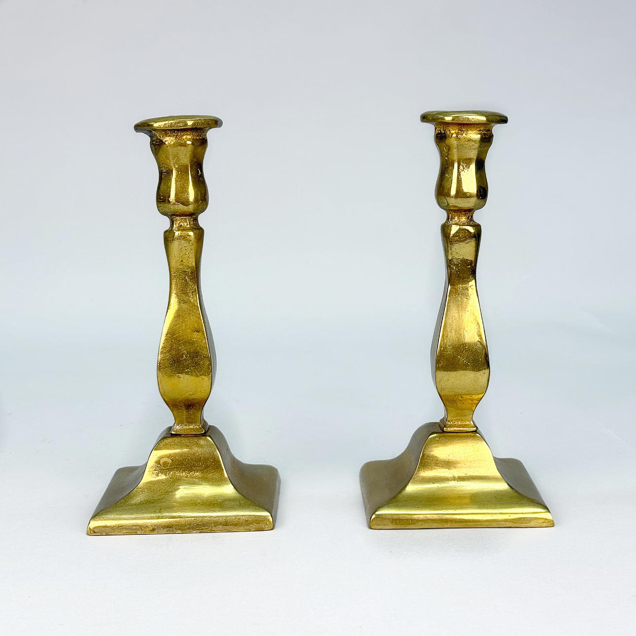 BRASS CANDLESTICKS - A Pair, Marked England.
