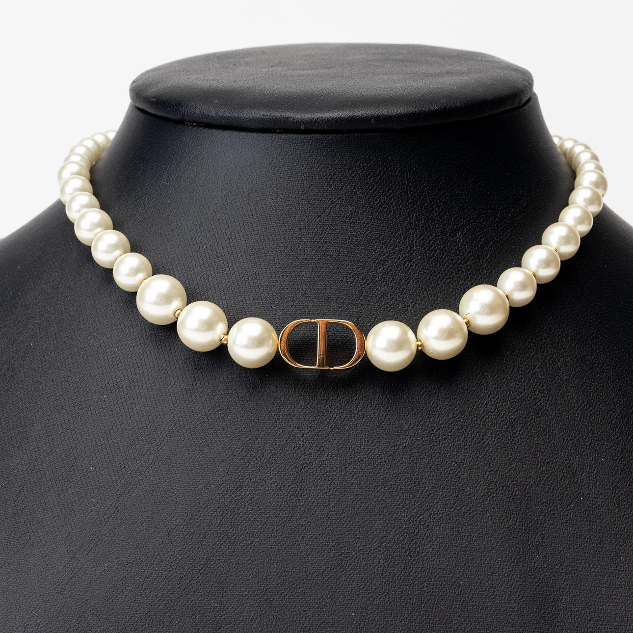 CHRISTIAN DIOR. Pearl necklace, bijouterie with logo, marked Dior