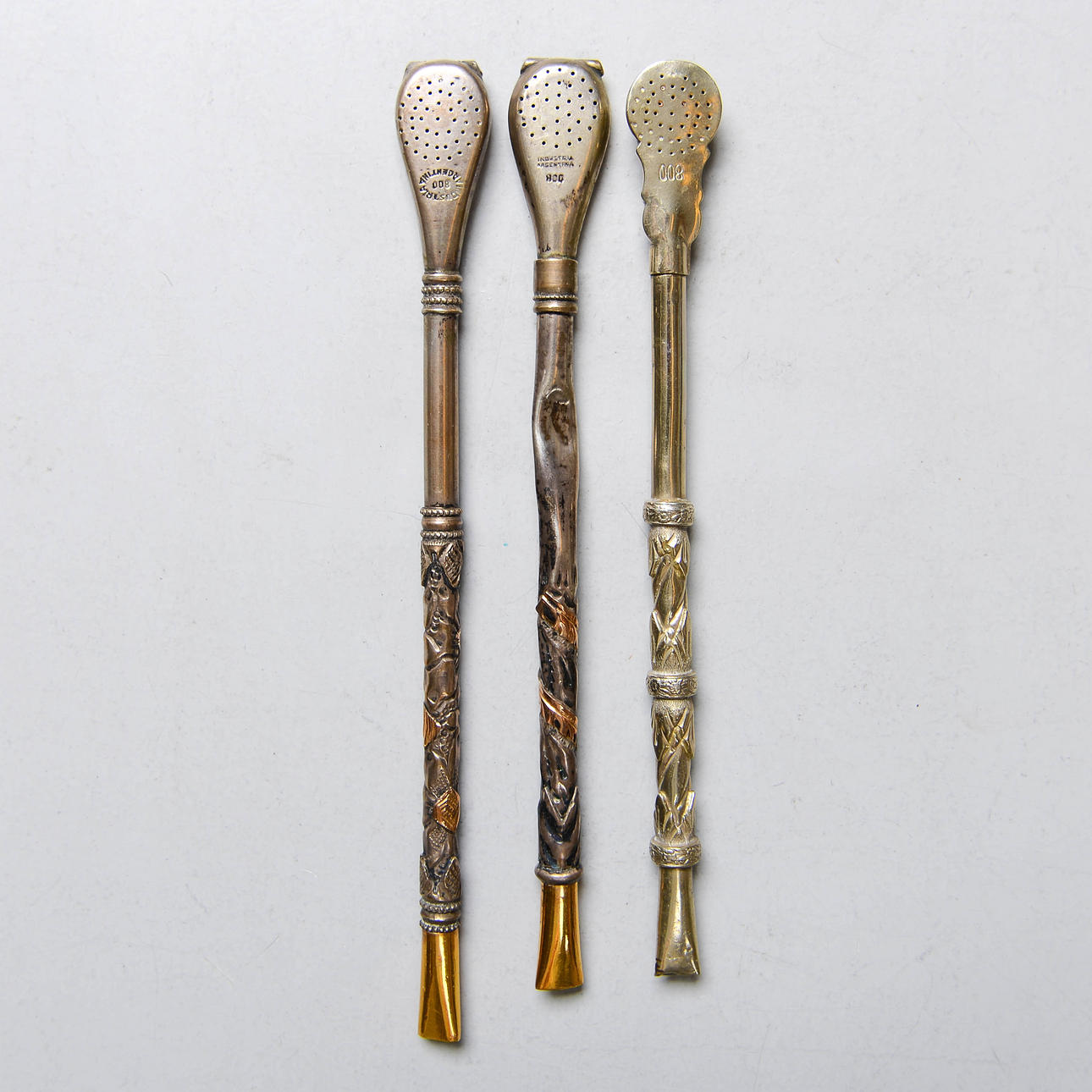 SUGRÖR, 2 st, munstycke i 18 k guld & silver, Argentina.