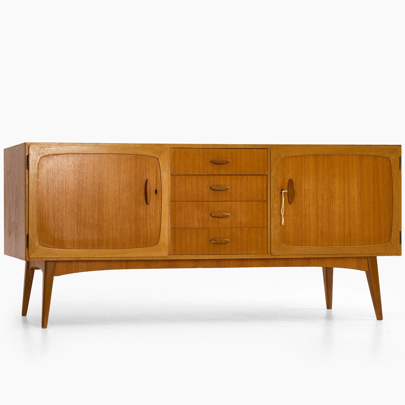 A 1960s sideboard, teak veneer.