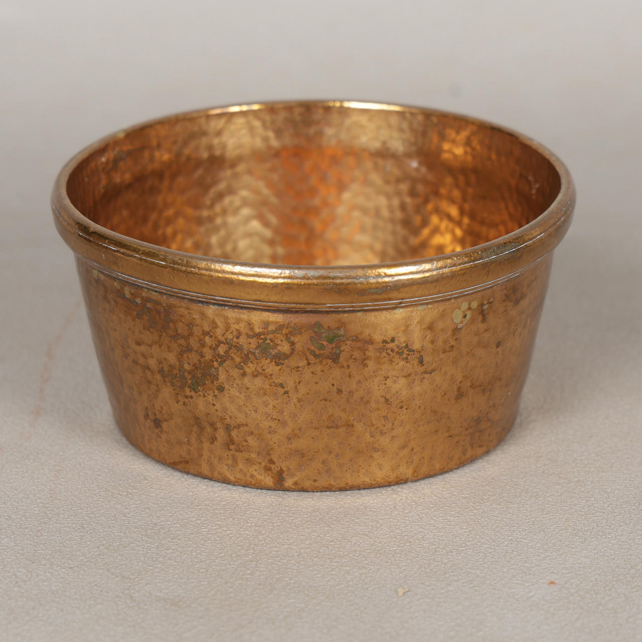 A BRASS WHITE STAR LINE DISH.