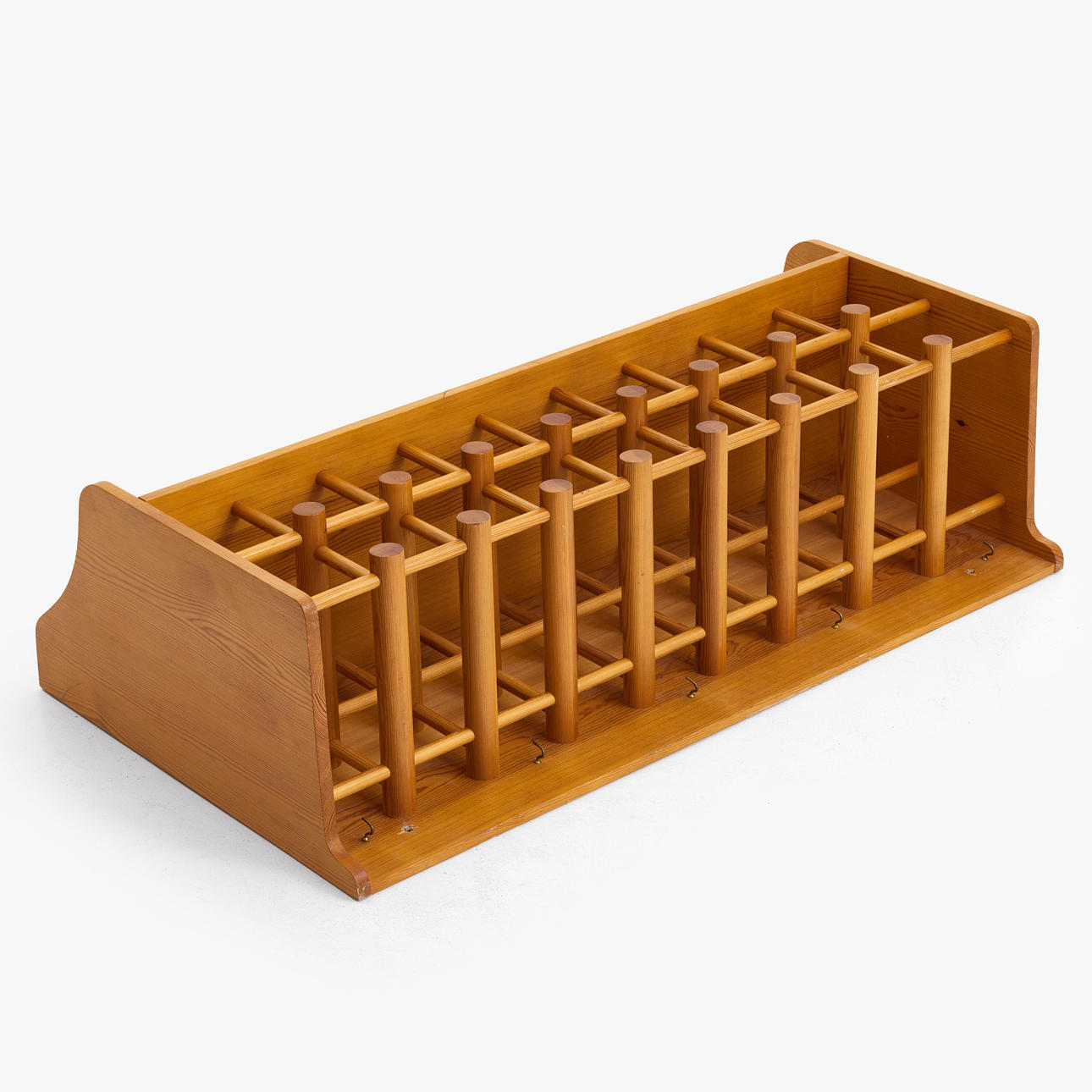 A 1970s-style shelf with wine rack, pine.