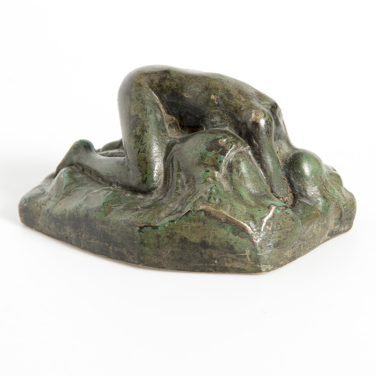 BREVPRESS, brons, kvinna på klippa.