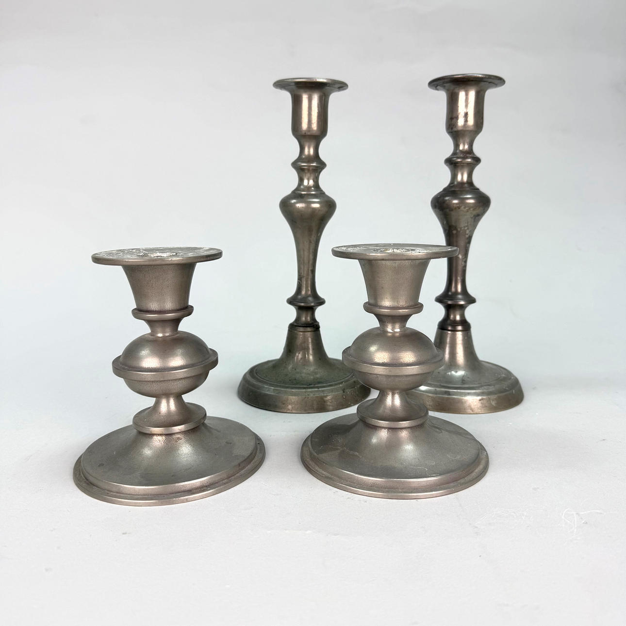 EDVIN OLLERS. PEWTER CANDLESTICKS, 4 pcs.