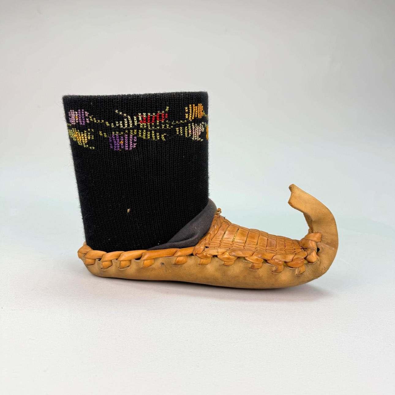 NAKEBSKO, leather and textile ornament.