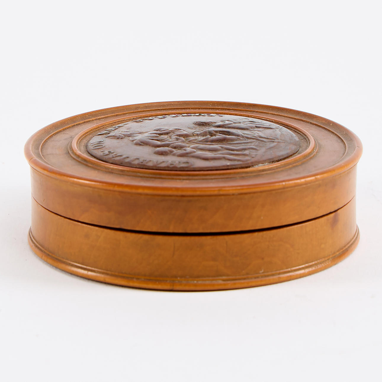 A box, turned wood, 19th century.