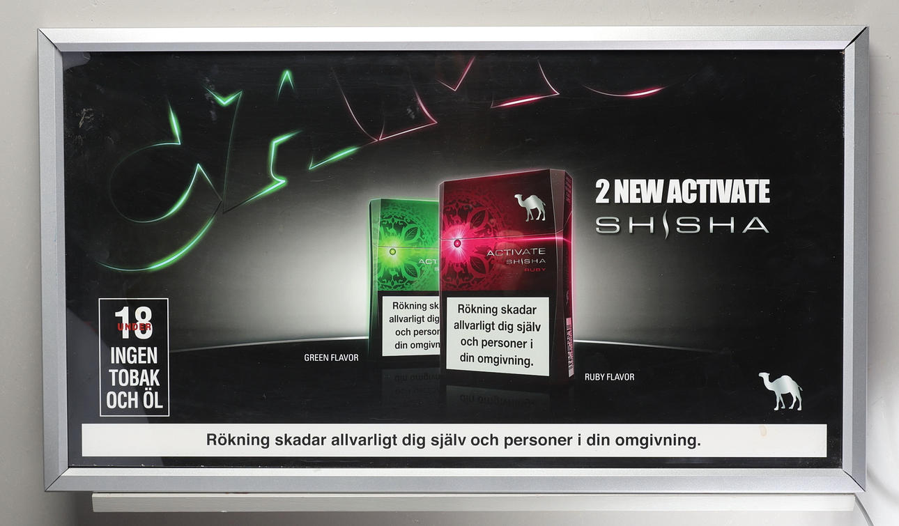 SKYLT. Reklamskylt "Camel" med belysning.