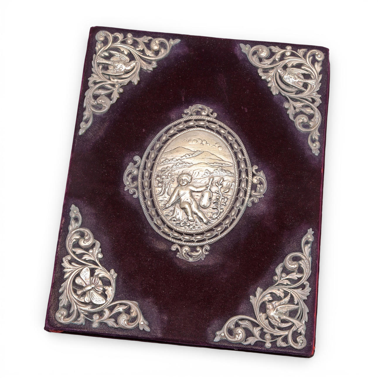 Velvet and silver binding.