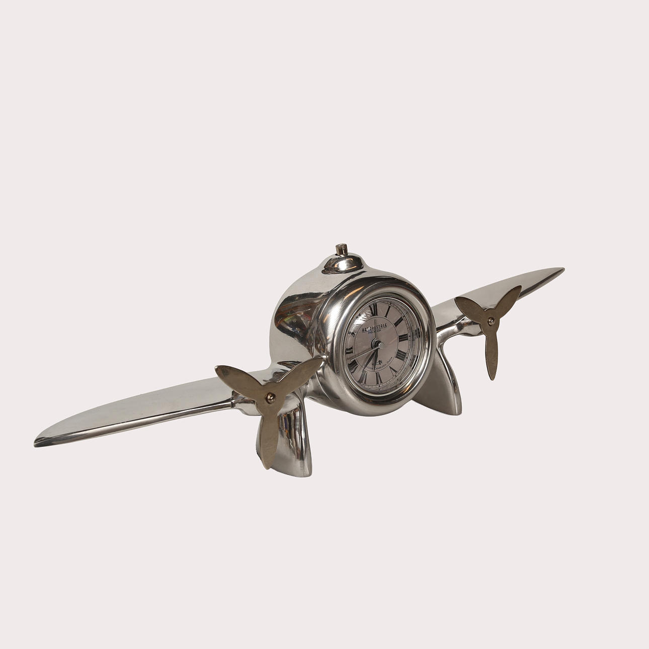 TABLE CLOCK, aluminum, in the shape of an airplane, marked Aeropostale ...