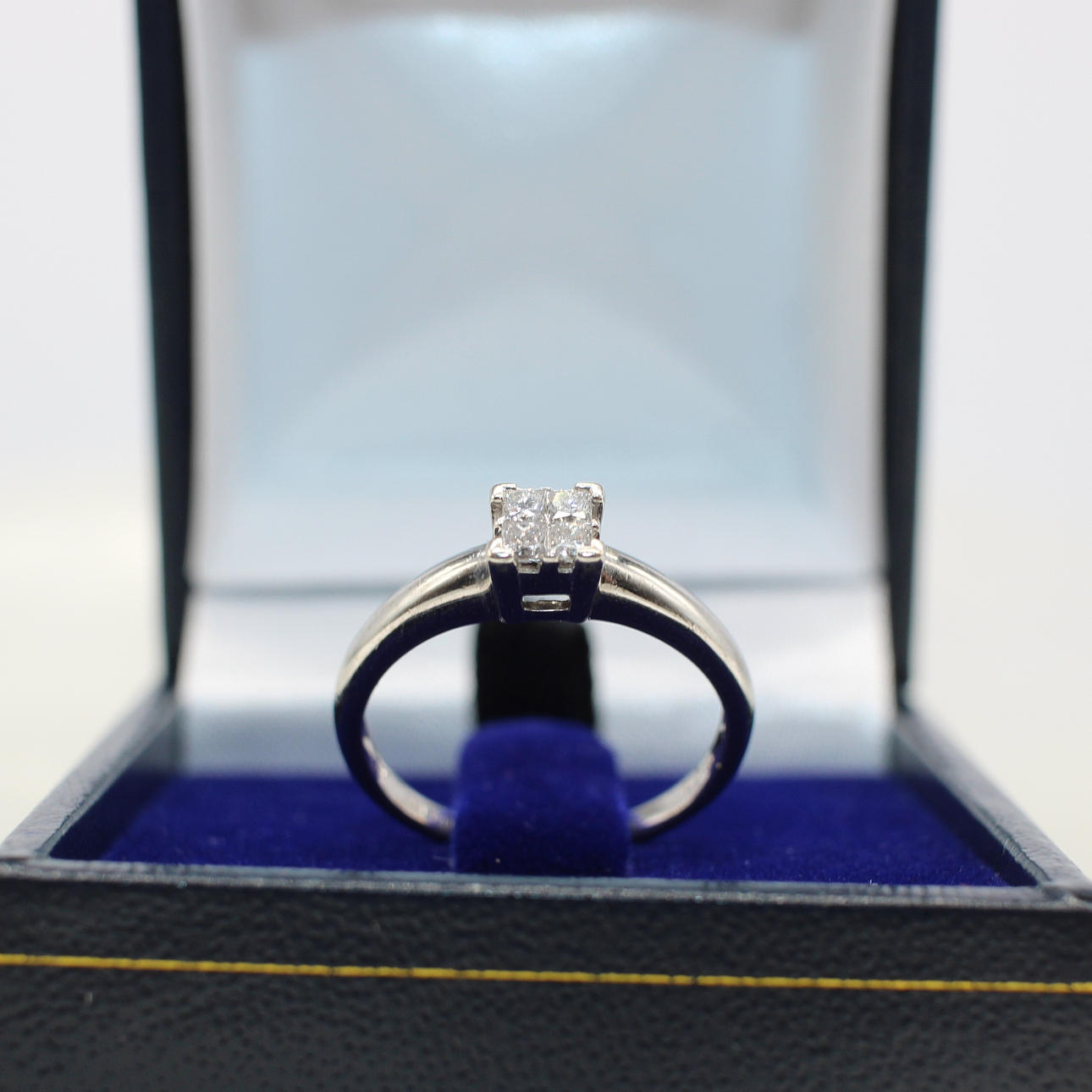 PRINCESS CUT DIAMOND RING.