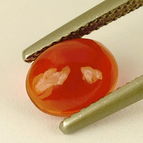 BRAND OPAL, 0.81 CT. rödaktig orange certificete.