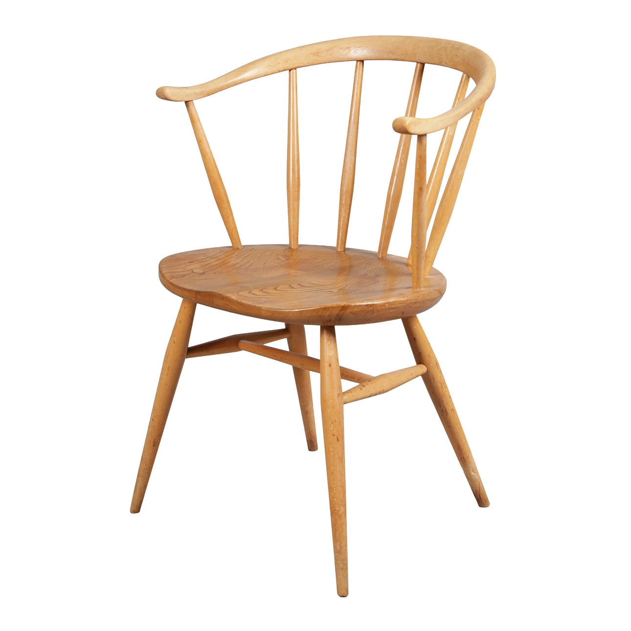 ERCOL MODEL 338 COWHORN FIRESIDE CHAIR.