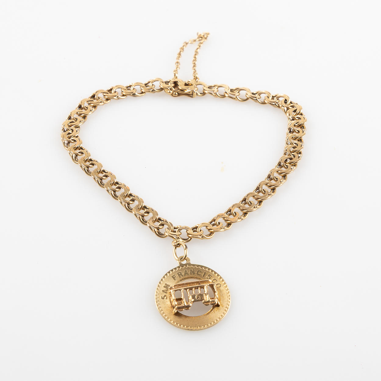 ARMLÄNK, 18K guld, berlock i 14K guld.