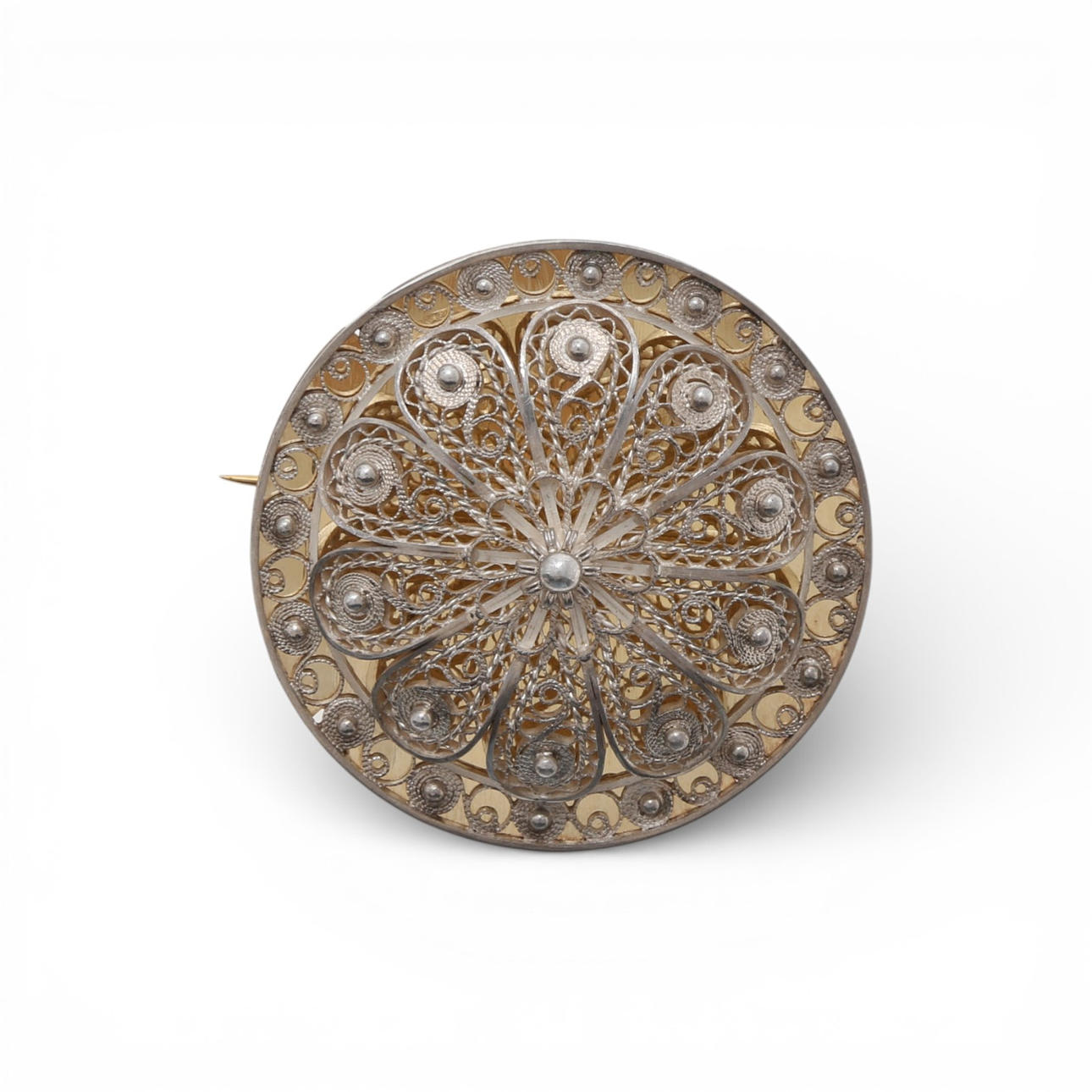 Silver filigree brooch-pendant.
