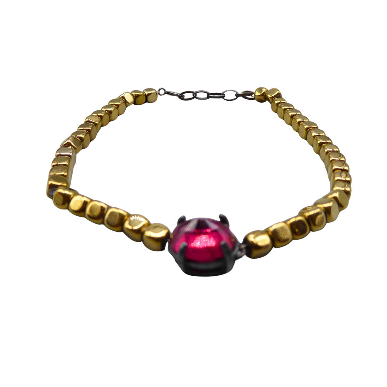 HEMATITE BRACELET WITH A NATURAL RUBY.
