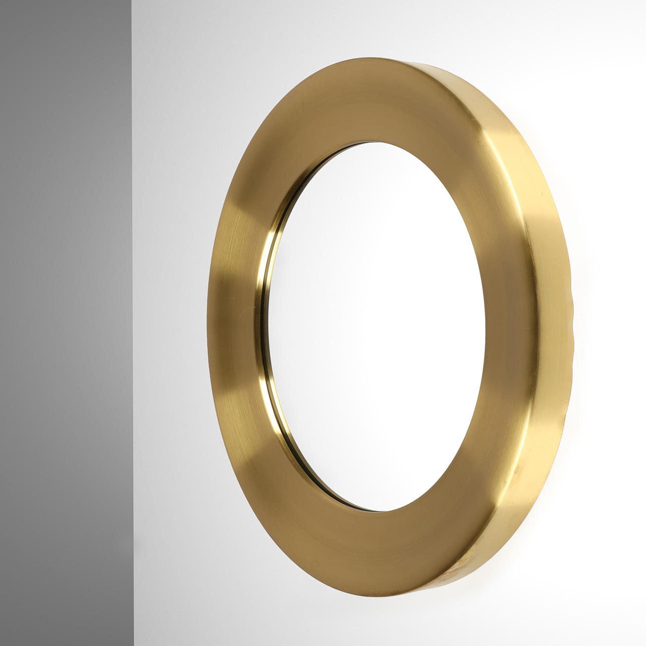 NILS TROËD. Circular mirror with brass frame, model no 133, Glasmäster Markaryd, Sweden, 1960s.