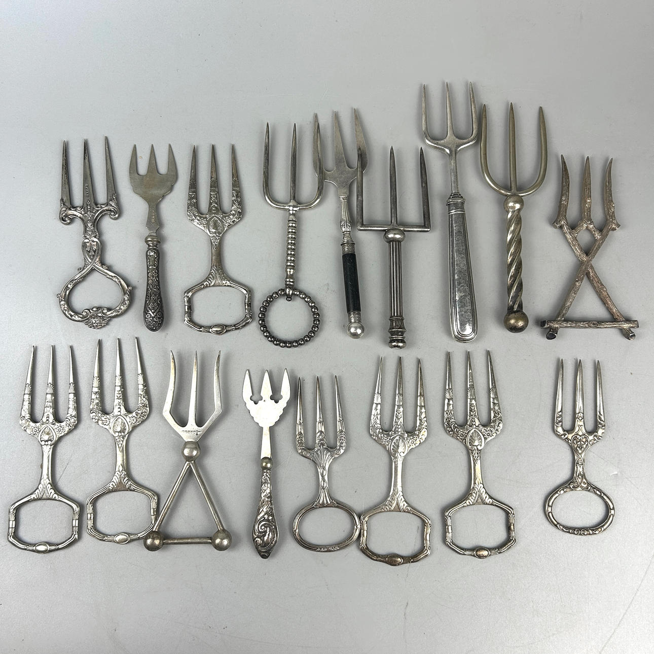 COLLECTION OF 19TH C BREAD FORKS.