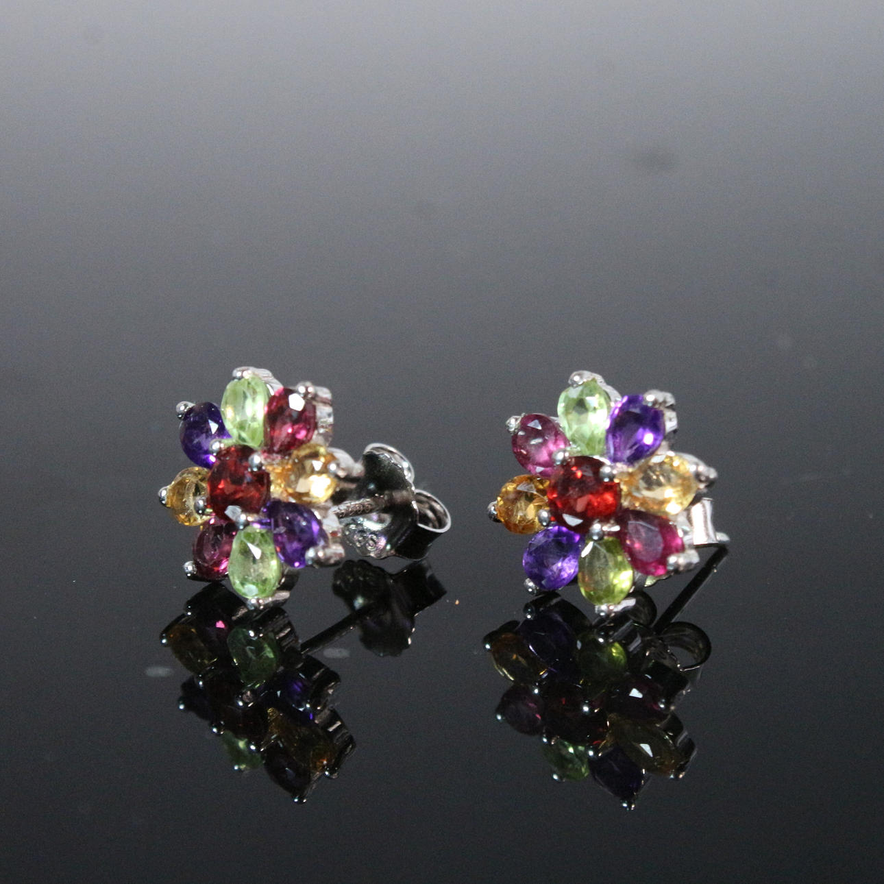 earrings with colorful gemstones.