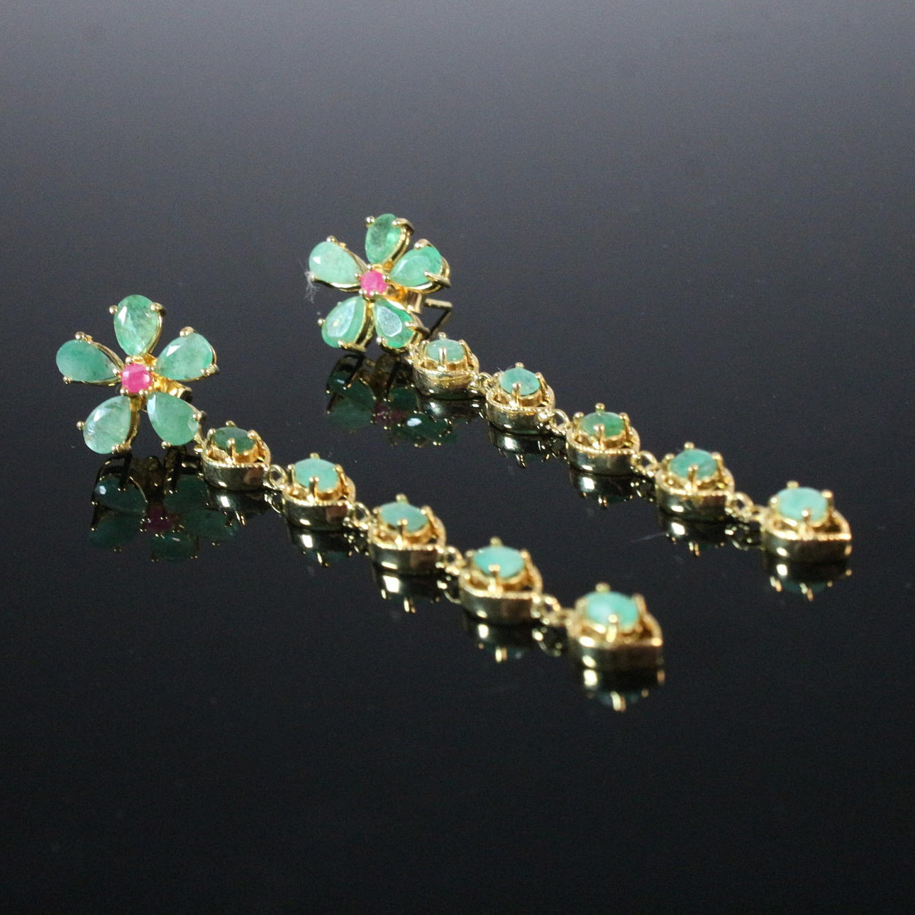 Emerald and ruby earrings.