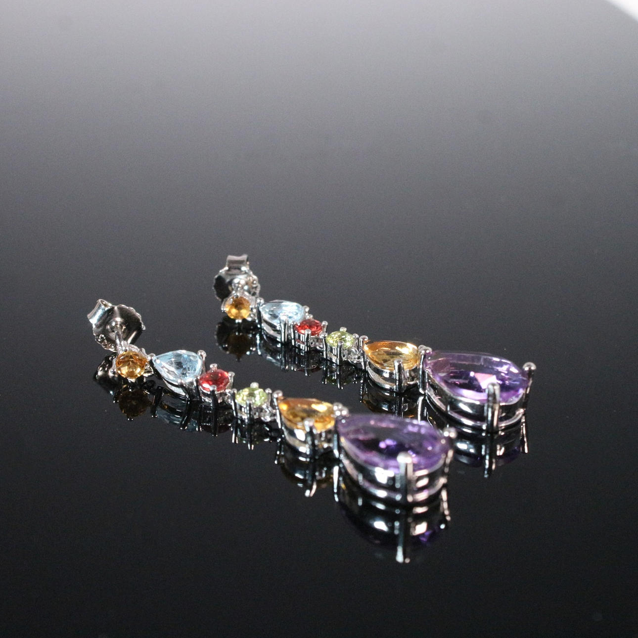 earrings with colorful stones.